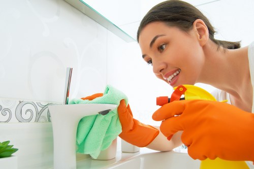 Local cleaner handling bathroom and bedroom reset for an Airbnb property